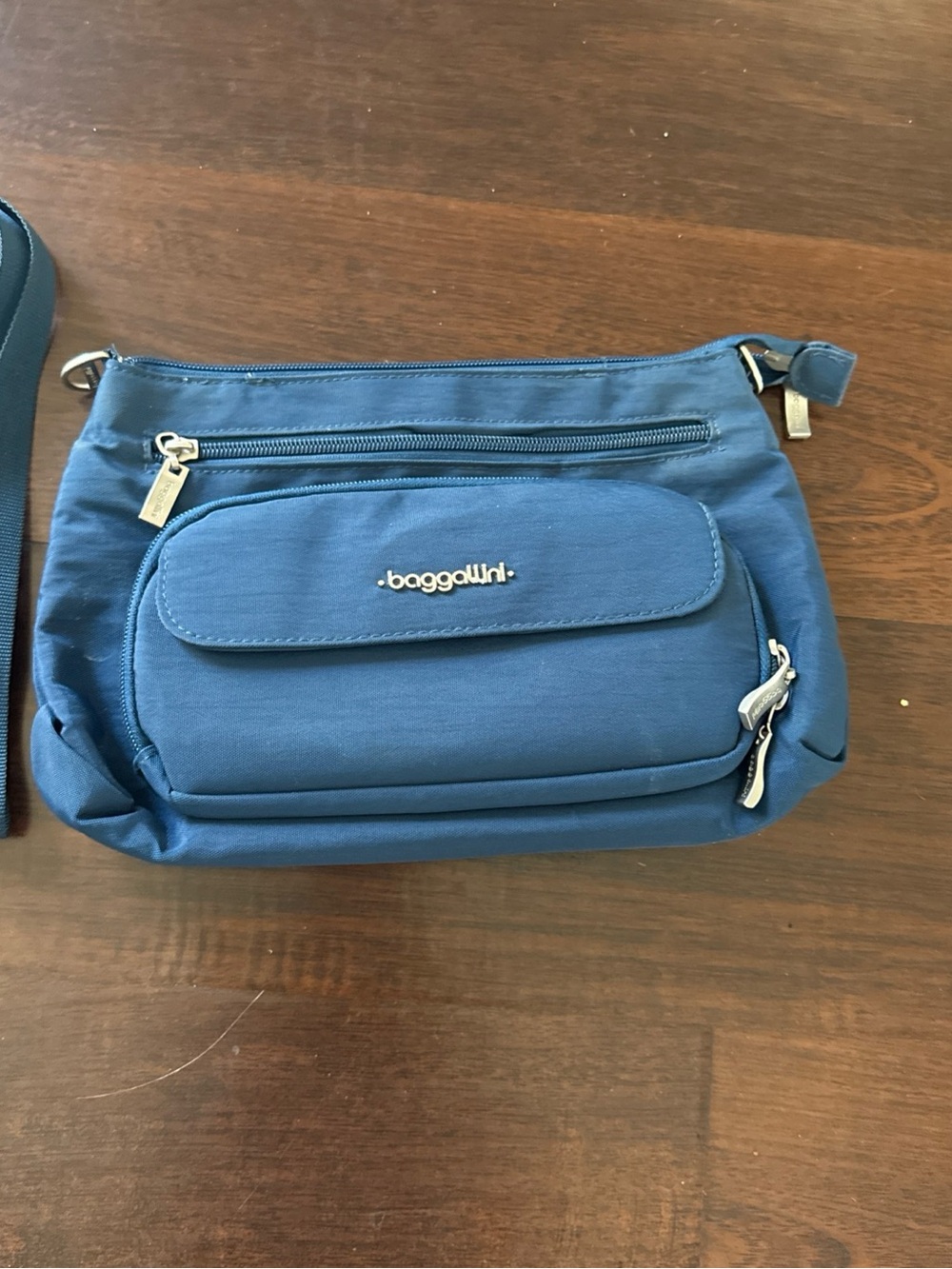 Baggallini navy blue crossbody with front pocket